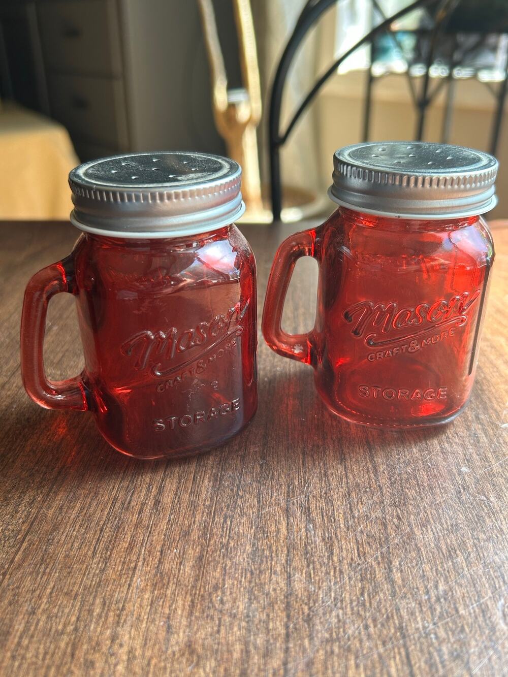 Pair of glass mason jar-style red salt and pepper shakers